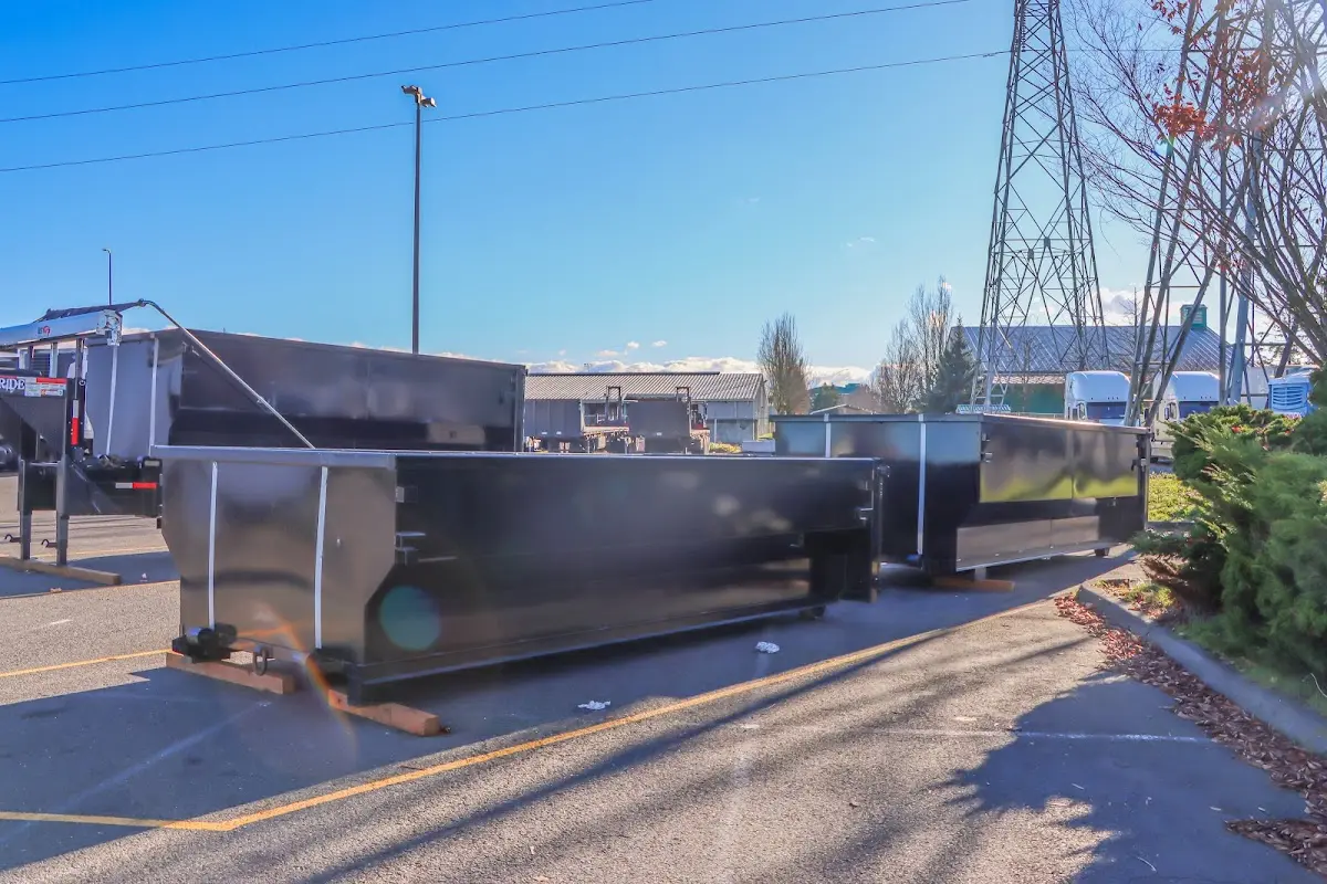 Roll-off dumpster ready for waste disposal at job site for Commercial Dumpster Rental in Livingston